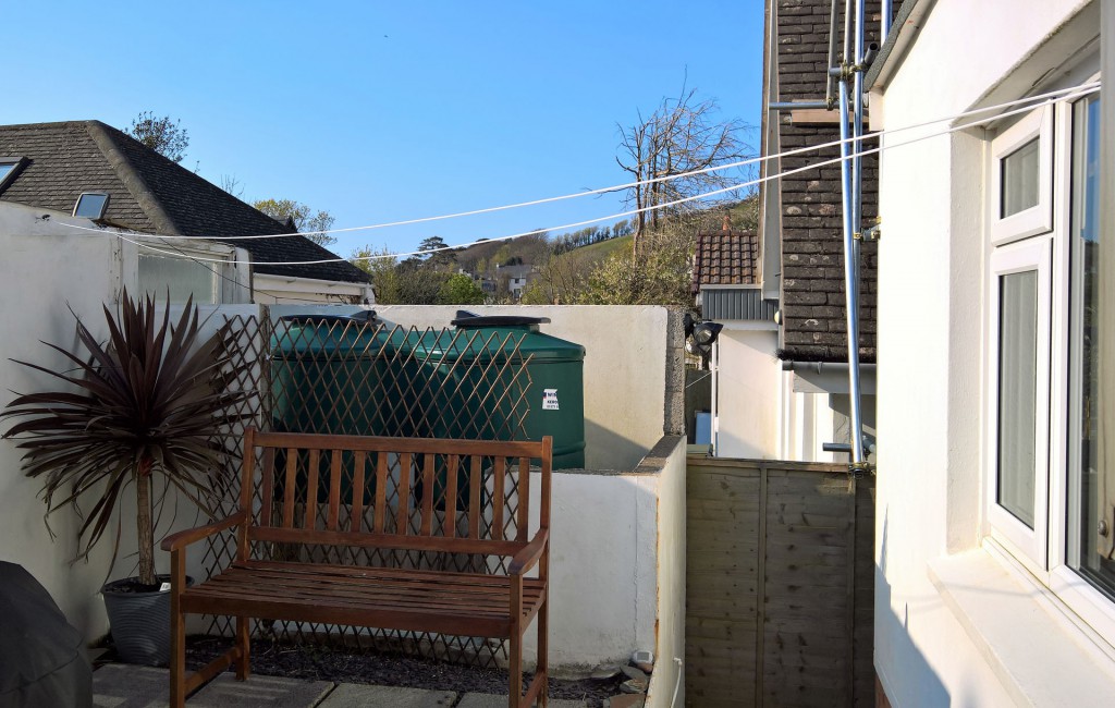 Washing line extended and hooked to the wall